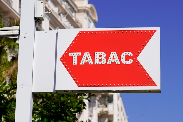 Flecha de marca de signo de tabaco de tienda roja francesa con texto en francés logotipo de tienda de tabaco