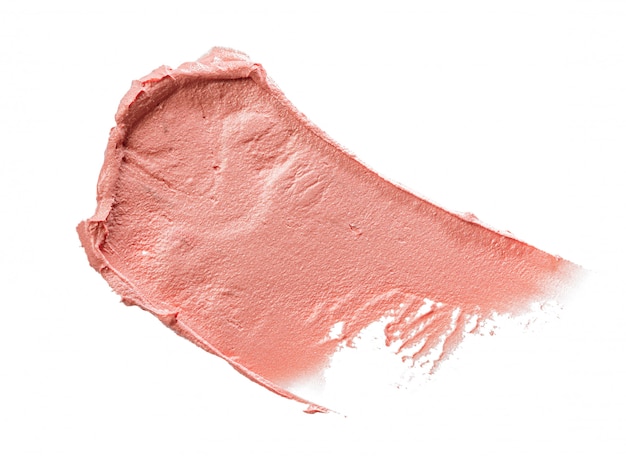 Flecken eines rosa lippenstifts lokalisiert auf weiß