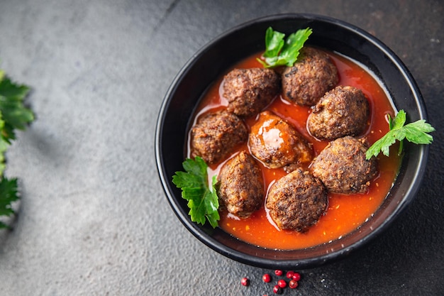 Fleischbällchen frische Tomatensauce Fleisch Fleischbällchen Essen Snack auf dem Tisch Kopie Raum Essen Hintergrund