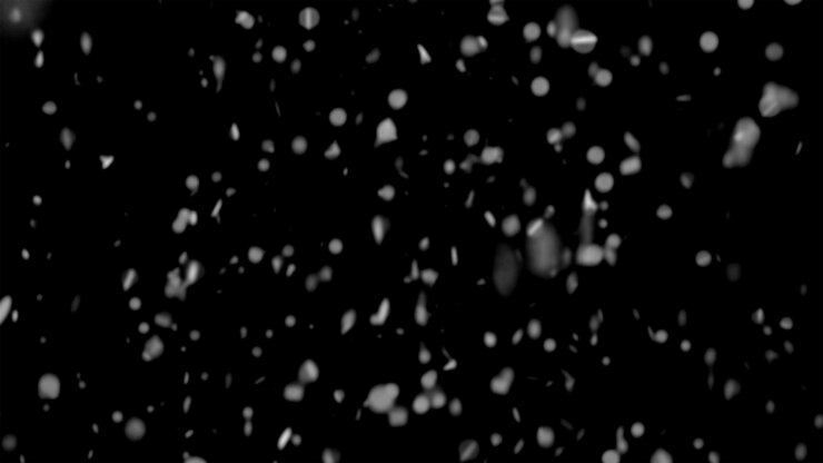 Foto flocos de neve caindo sobre um fundo preto