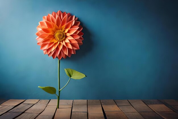 Una flor en un jarrón sobre una mesa de madera con un fondo azul.