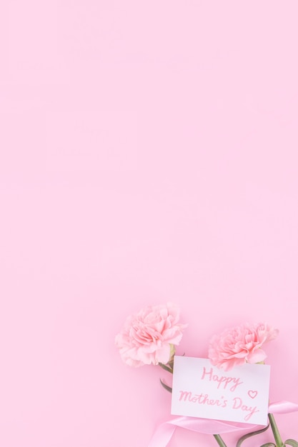 Flores con mensaje de feliz día de la madre | Foto Premium
