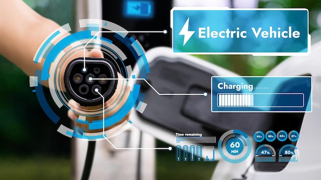 Focalize a mão apontando o carregador EV na frente da câmera, exibindo o holograma de status da bateria inteligente em fundo desfocado Carregador de carro elétrico usando energia limpa, reduzindo a emissão de CO2Peruse