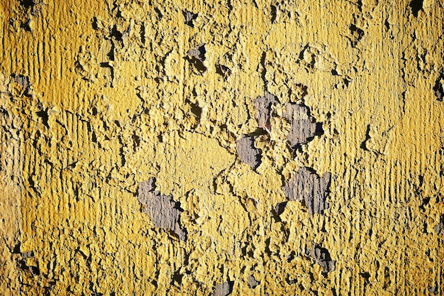 Folha de fundo amarela com textura de parede de rua vintage grunge