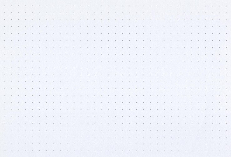Foto folha de fundo de papel de caderno amarelo pálido pontilhado em branco imagem extra grande altamente detalhada