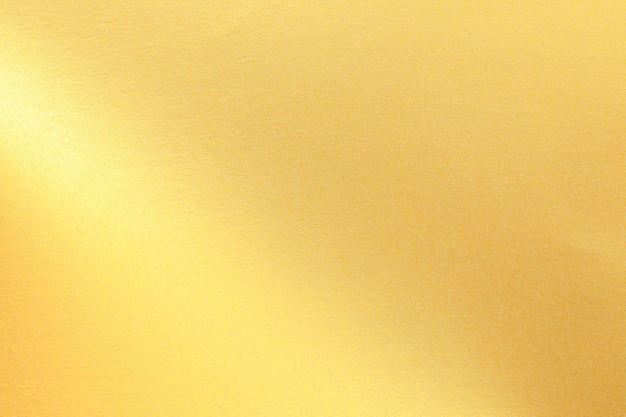 Foto folha de fundo de textura de ouro amassada dourada