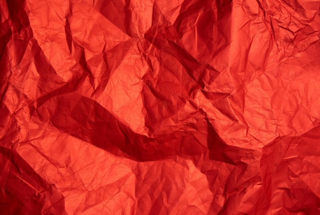 Folha de papel vermelha amassada Textura de papel Fundo para designers Textura de fundo abstrata