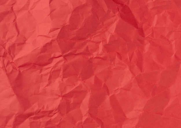 Folha enrugada de papel vermelho pano de fundo texturizado