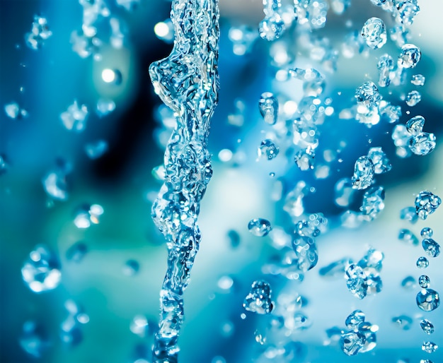 Fondo abstracto de agua azul Gotas de agua que caen Fotografía macro