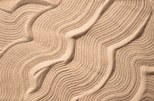 Fondo abstracto de arena ondas de arena abstractas como un fondo copia macro de espacio