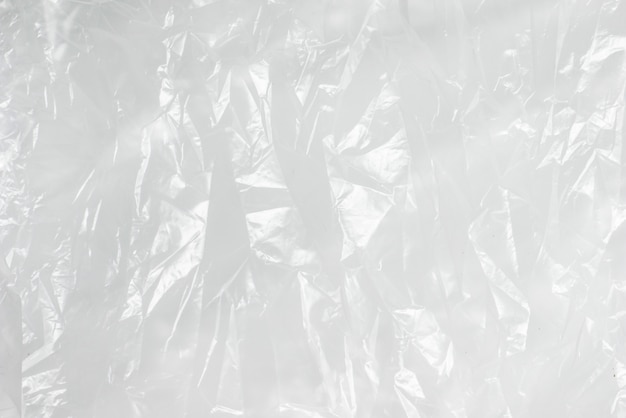 Foto fondo abstracto arrugado película plástica textura blanco bolsa de basura