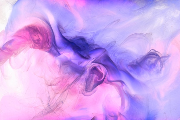 Fondo abstracto de arte fluido líquido Pintura acrílica azul rosa bajo el agua océano de humo galáctico