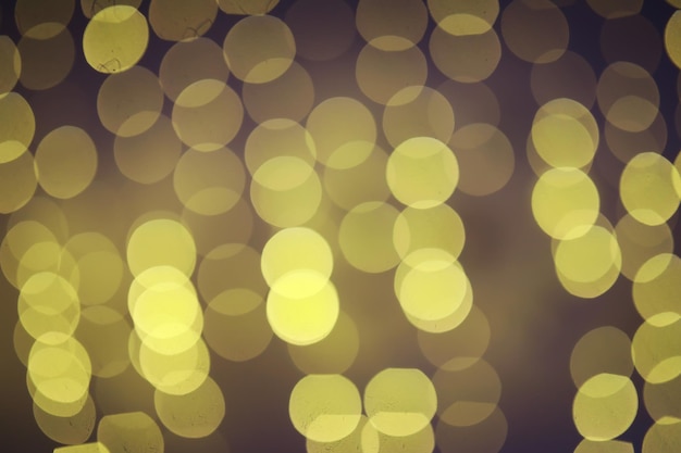 Fondo abstracto bokeh Círculos dorados bokeh sobre fondo azul oscuro Superposición de capa