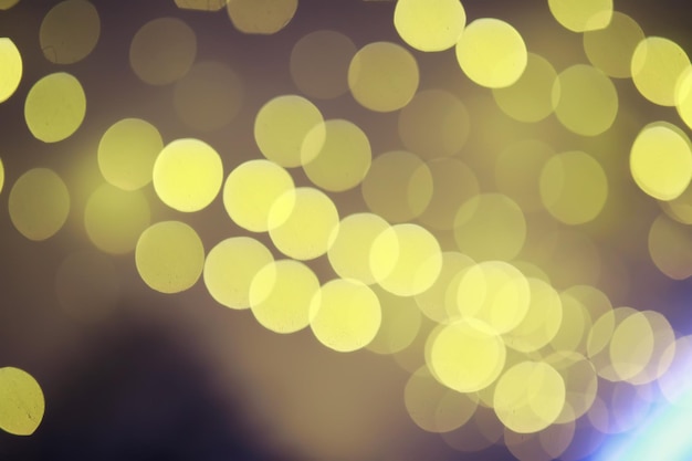 Fondo abstracto bokeh Círculos dorados bokeh sobre fondo azul oscuro Superposición de capa