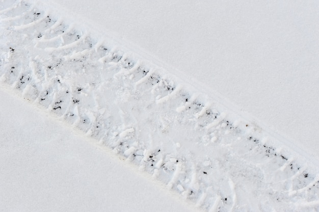 Fondo abstracto - coche de trail en la nieve