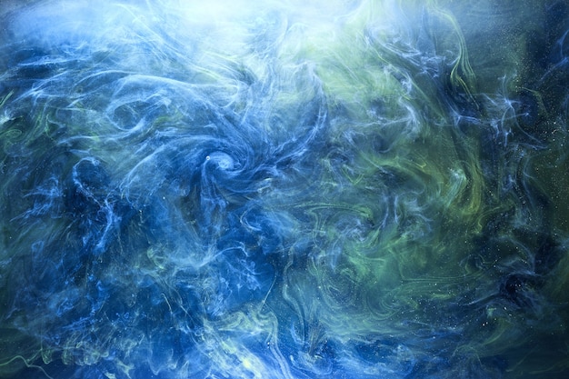 Fondo abstracto de colores de la tierra, pintura colorida de humo bajo el agua, remolinos de tinta en el agua, exoplaneta azul mar océano