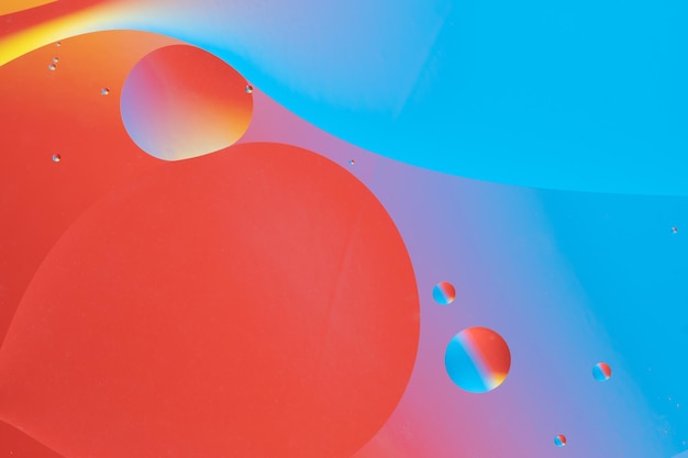 Fondo abstracto colorido con formas de burbujas dinámicas Gradiente rojo y azul