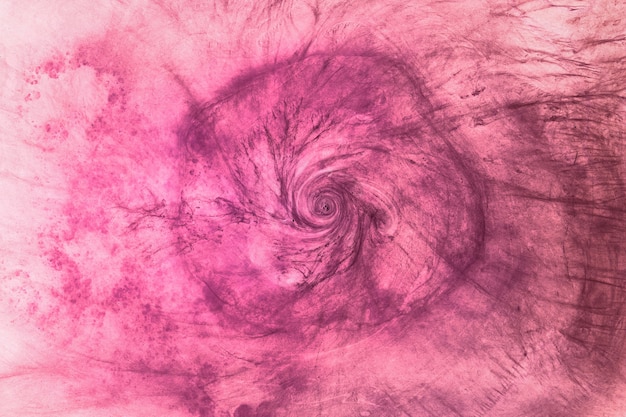Fondo abstracto de explosión púrpura rosa. espacio exterior de color violeta, acrílicos arremolinados en papel tapiz de agua, concepto de aroma de cereza y rosa