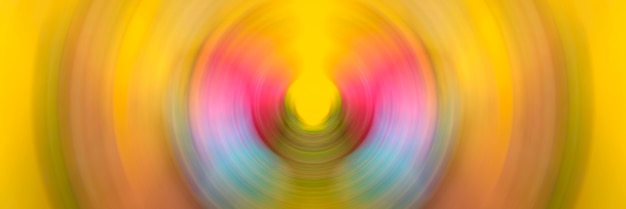Foto fondo abstracto de la falta de definición de movimiento radial del círculo colorido de la vuelta.
