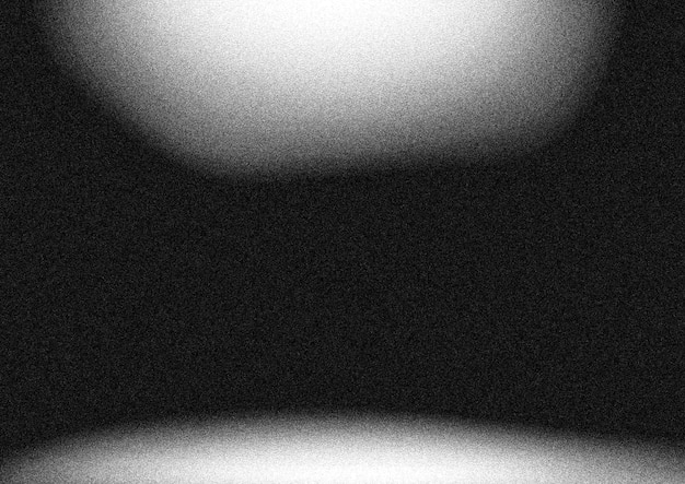 El fondo abstracto del gradiente granulado es gris ruidoso, negro, plateado y borroso.