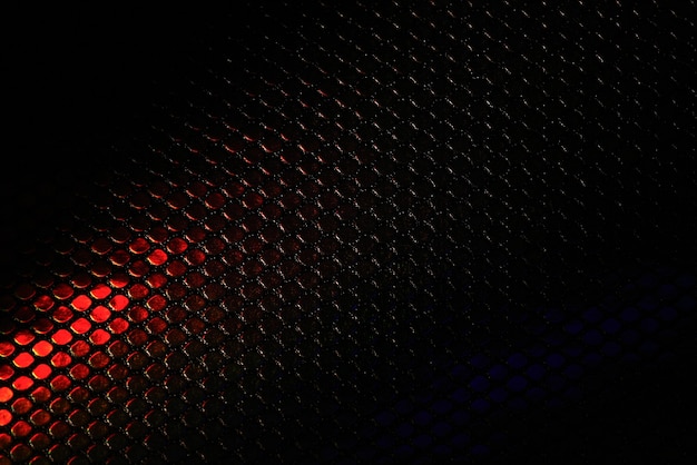 Fondo abstracto hexágono metálico negro con rojo