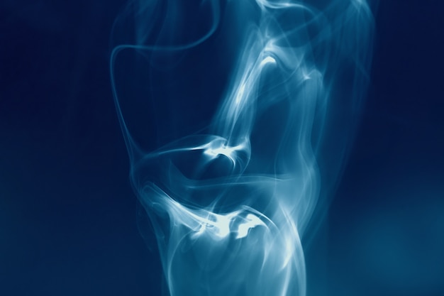 Fondo abstracto con humo en forma de calavera