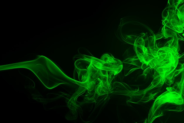 Fondo abstracto de humo verde. concepto de oscuridad