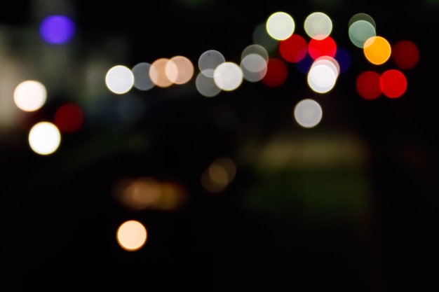 Fondo abstracto de luces de la ciudad borrosa con efecto bokeh