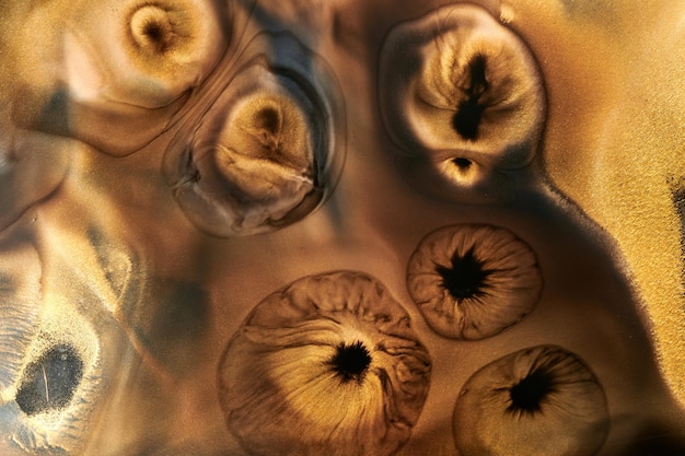 Fondo abstracto de lujo arte líquido Mezcla de pintura de oro negro manchas de tinta de alcohol textura de mármol Patrón de impresión moderno