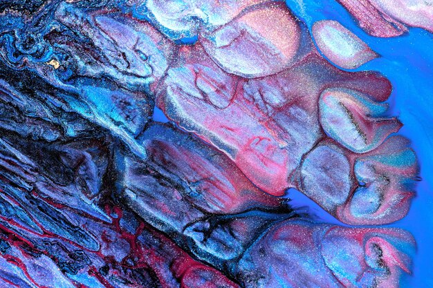 Fondo abstracto de lujo arte líquido Mezcla de tinta de alcohol azul rojo con manchas de pintura dorada Textura de mármol de la superficie del agua de la tierra