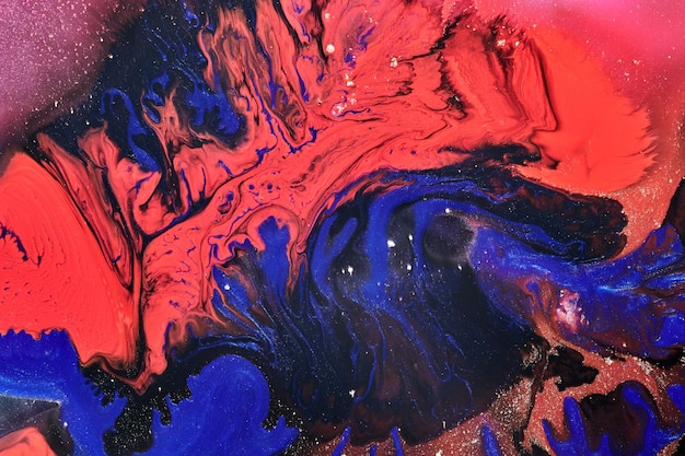 Fondo abstracto de lujo arte líquido Mezcla de tinta de alcohol azul rojo con manchas de pintura dorada Textura de mármol de la superficie del agua de la tierra