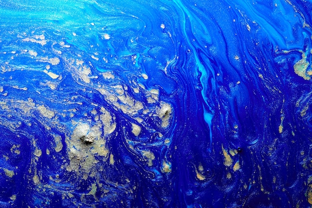 Fondo abstracto de lujo arte líquido Tinta de alcohol azul con rayas de pintura dorada superficie de agua textura de mármol