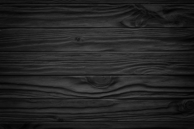 Fondo abstracto de madera negra con luz y arañazos, textura de madera oscura