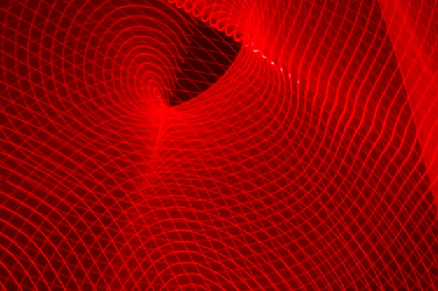 Fondo abstracto de ondas de neón rojo