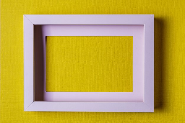 Foto fondo abstracto del papel del colofrul del minimalismo con el marco vacío.