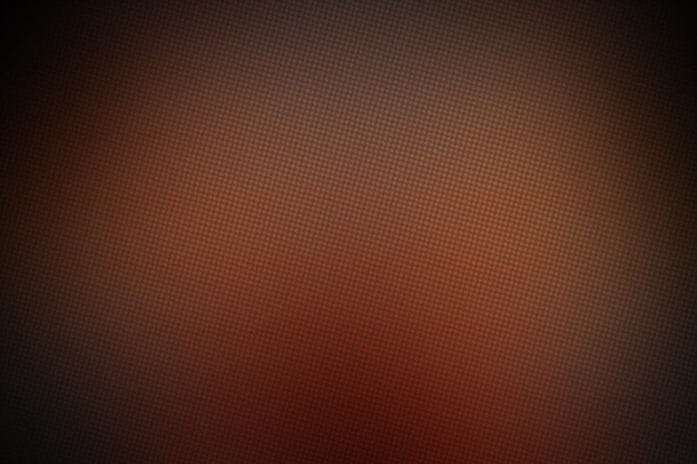 Fondo abstracto con puntos de medio tono en colores naranja y rojo