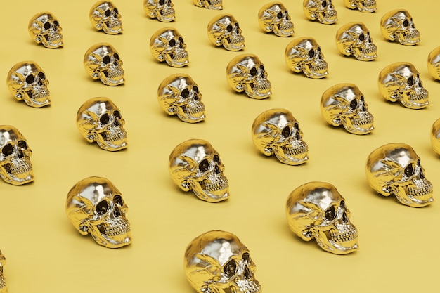 Un fondo abstracto que consta de patrones de cráneos humanos dorados sobre un fondo amarillo