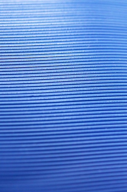 Fondo abstracto de rayas azules en plástico