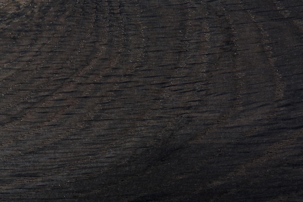 Fondo abstracto de roble de madera natural negro. Foto de alta resolución.