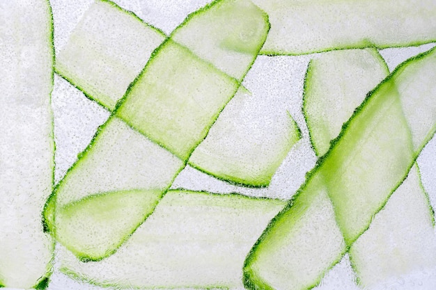 Fondo abstracto de rodajas de pepino congelado