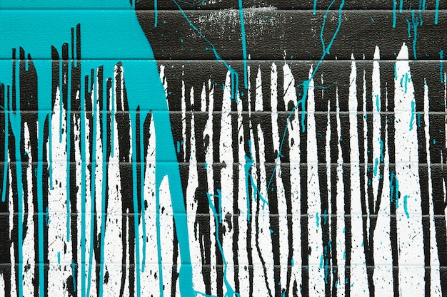 Fondo abstracto de salpicaduras de pintura azul y negra