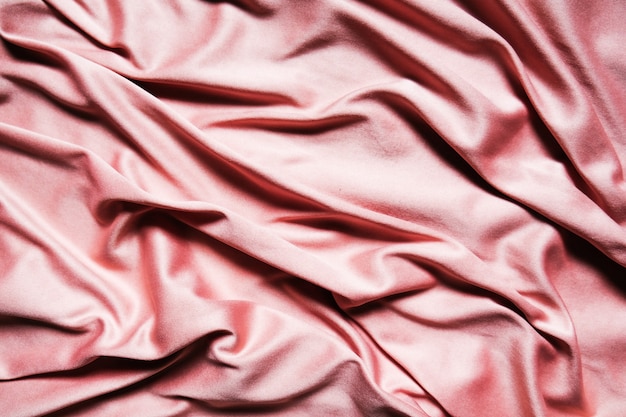 Fondo abstracto textil rosa. De cerca