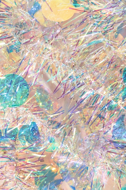 Fondo abstracto de textura de guirnalda de oropel de Navidad en colores pastel.