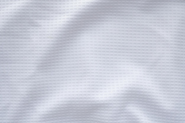 Foto fondo abstracto de textura de jersey de camiseta de fútbol de tela de ropa deportiva blanca