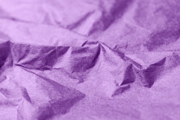 Fondo abstracto de textura de papel violeta arrugado