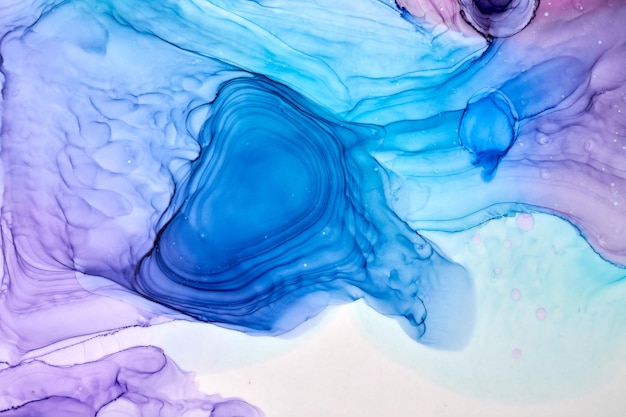 Fondo abstracto de tinta azul púrpura textura de mármol patrón de arte fluido papel pintado mezcla de pintura bajo el agua