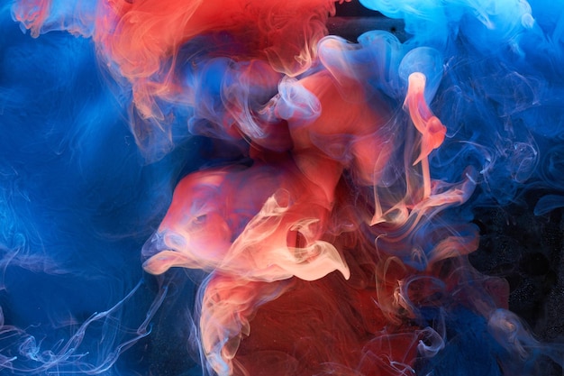 Fondo abstracto de tinta roja azul Fondo de pintura acrílica para perfume hookah cosméticos Misteriosas nubes de humo niebla colorida