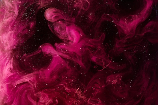 Fondo abstracto de universo rosa remolino galaxia humo alquimia danza de amor y pasión Misterioso espacio exterior esotérico exoplaneta cielo