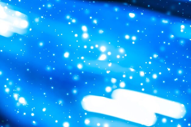 Foto fondo abstracto de vacaciones de invierno nieve brillante y brillo brillante brillante mágico