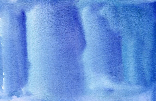 Fondo de acuarela abstracta azul sobre papel con textura. Fondo de acuarela hecho a mano